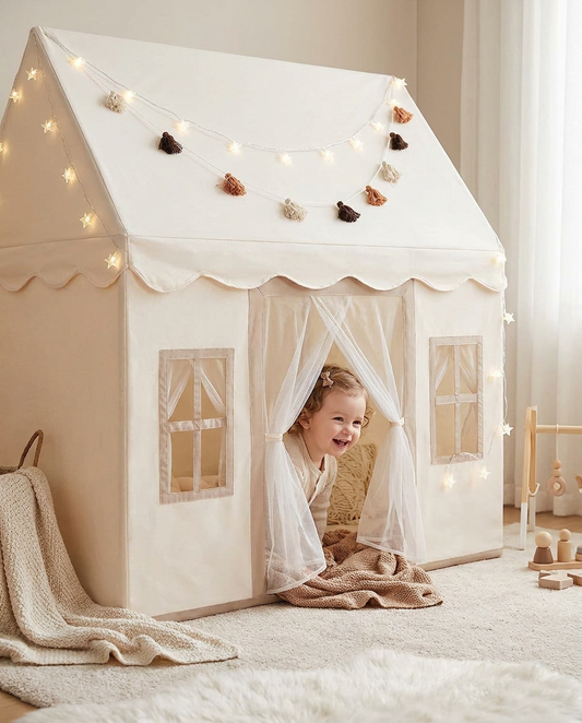 Toddler peeking out of the play tent